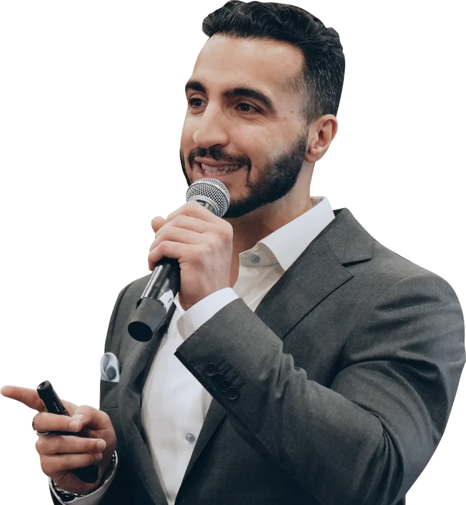allen-ashouri-speaking-on-stage-cutout